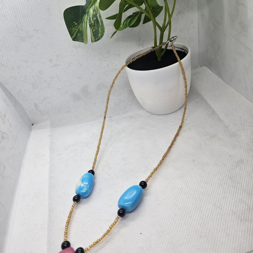 Gold-Tone Necklace with Bright Blue Beads and Black Accents